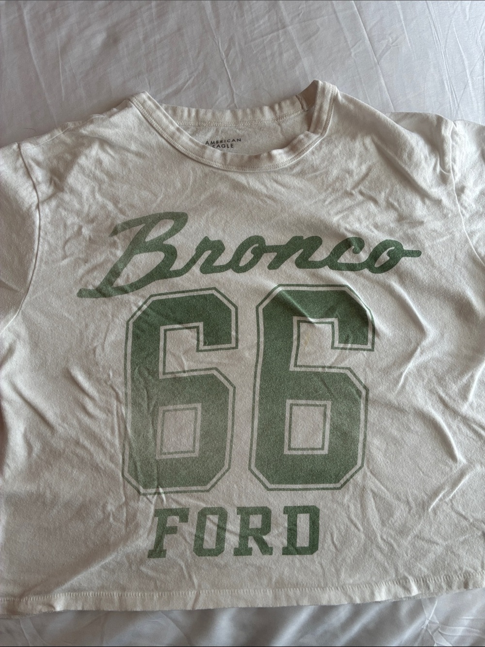 American Eagle Outfitters White Tee with Green 'Bronco 66 Ford' Graphic